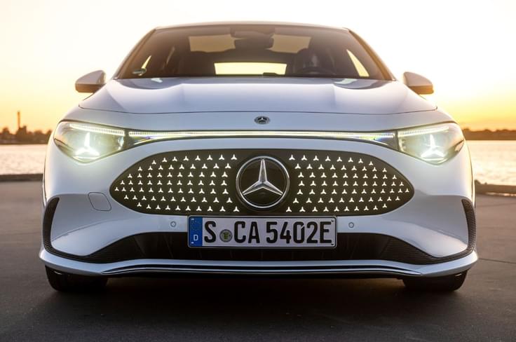 Sealed-off grille is studded with 142 illuminated Mercedes stars. Mercedes-Benz CLA EV front static